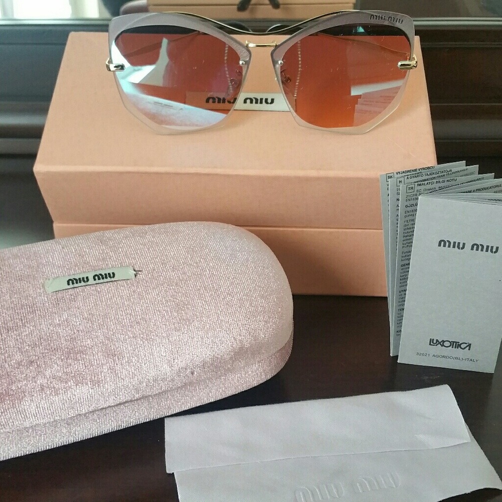Miu miu Sunglasses